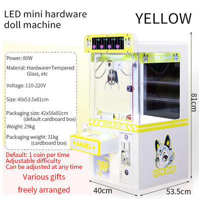 Máy chơi arcade cầm móng máy tính bàn LED hoạt động bằng đồng xu màu vàng